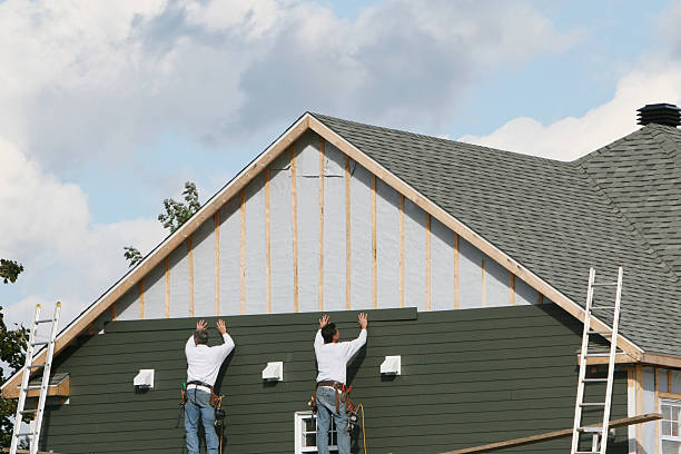 Professional Siding technician working in Aspers, PA